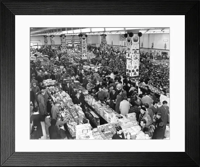 Framed Print : Shoppers looking for bargain Christmas presents at Woolworths store, Market Way