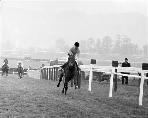 Jockey Pat Taaffe brings Arkle into the last straight before the last fence home on his