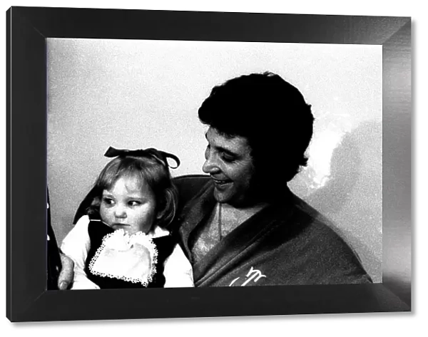 Tom Jones with three year old hole-in-the-heart patient Lisa Anne Scott from Gateshead