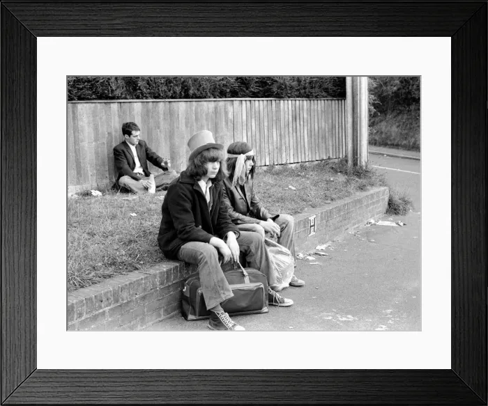 Framed Print : Pop fans waiting around at The Isle of Wight Festival. 30th August 1969 Framed Print : Pop fans waiting around at The Isle of Wight Festival. 30th August 1969