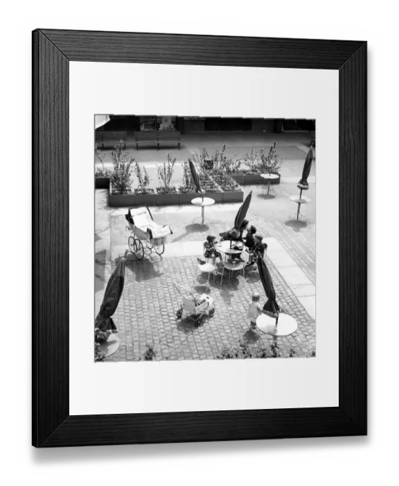 Framed Print : Seating ouside the circular Godiva Cafe in the Lower Precinct
