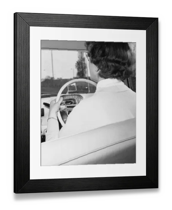 Framed Print : Woman learner driver seen here behind the wheel of a Vauxhall Victor Framed Print : Woman learner driver seen here behind the wheel of a Vauxhall Victor