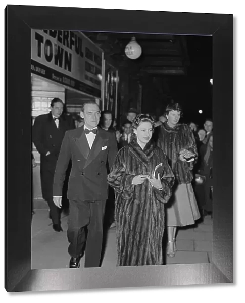 Princess Margaret leaves a West End theatre in London with her escort Billy Wallace