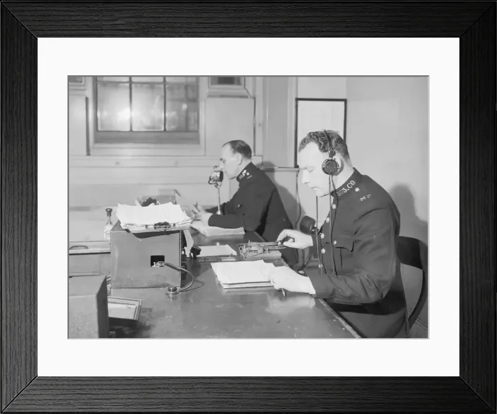 Framed Print : Radio and telegraph officers on duty in Scotland Yards information room Framed Print : Radio and telegraph officers on duty in Scotland Yards information room
