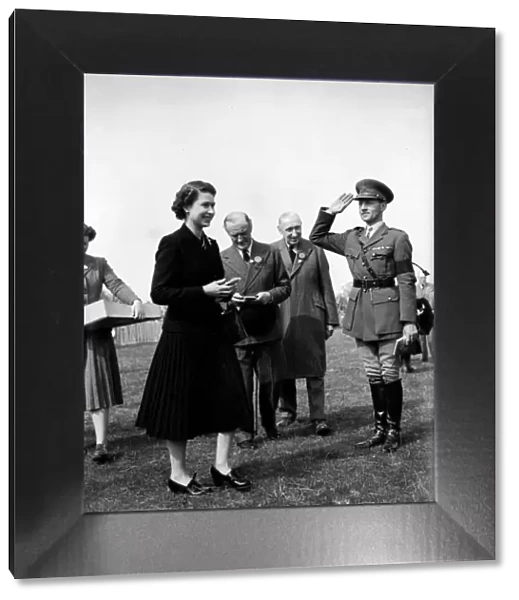 Queen Elizabeth with Major JWC Weldon at Badmington Horse trials. May 1953