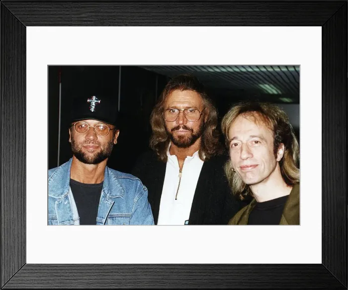 Framed Print : Bee Gees pop group with three brothers arrive at Heathrow from New York Framed Print : Bee Gees pop group with three brothers arrive at Heathrow from New York