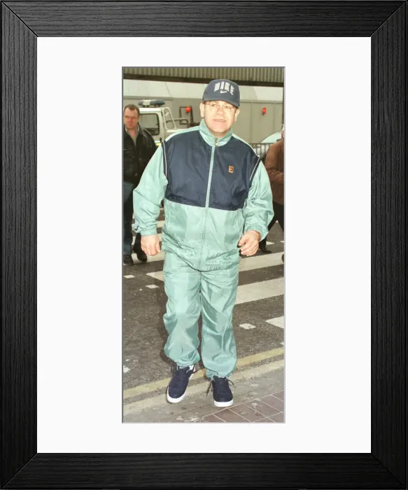 Framed Print : Sir Elton John leaving Heathrow on his way March 1998 to Australia Framed Print : Sir Elton John leaving Heathrow on his way March 1998 to Australia