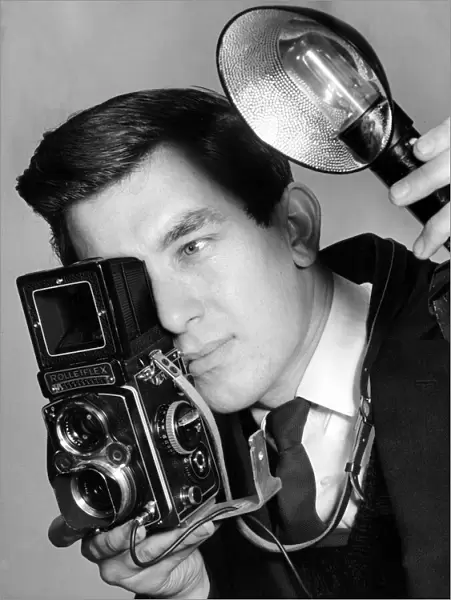 Daily Mirror Staff Photographer Alisdair MacDonald aged 21. February 1962
