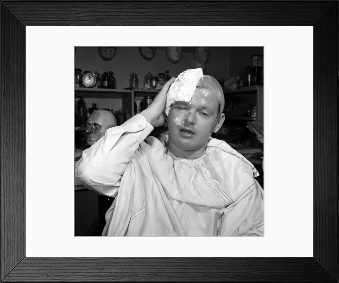 Framed Print : Comedian Benny Hill having a plaster cast of his skull made Framed Print : Comedian Benny Hill having a plaster cast of his skull made