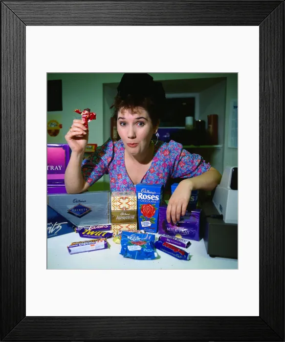 Framed Print : Teri Lally eating chocolate June 1990