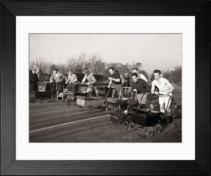Framed Print : Dads take part in a Pram Race in Bognor Sussex on Boxing Day Pram - Men