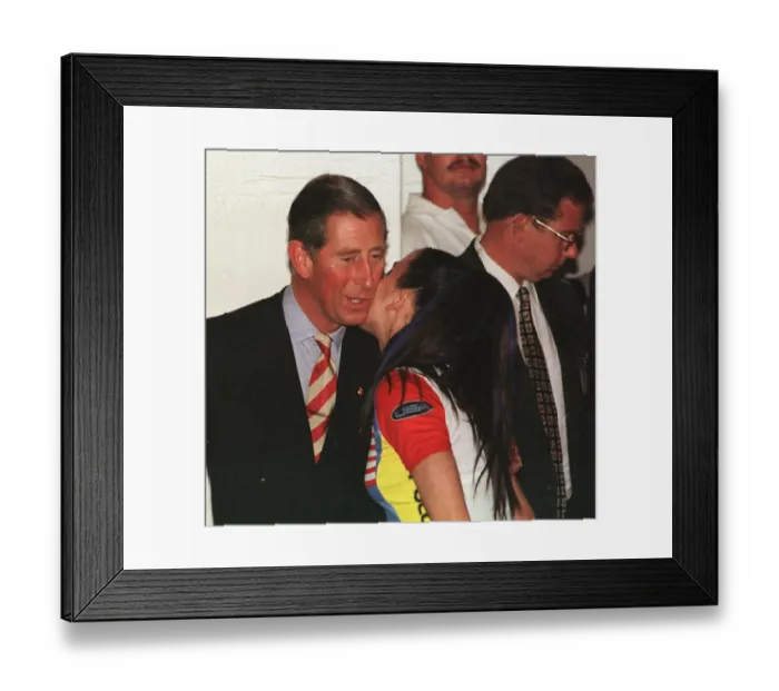 Framed Print : Prince Charles gets a kiss from Spice Girl Mel C in Johannesburg Framed Print : Prince Charles gets a kiss from Spice Girl Mel C in Johannesburg
