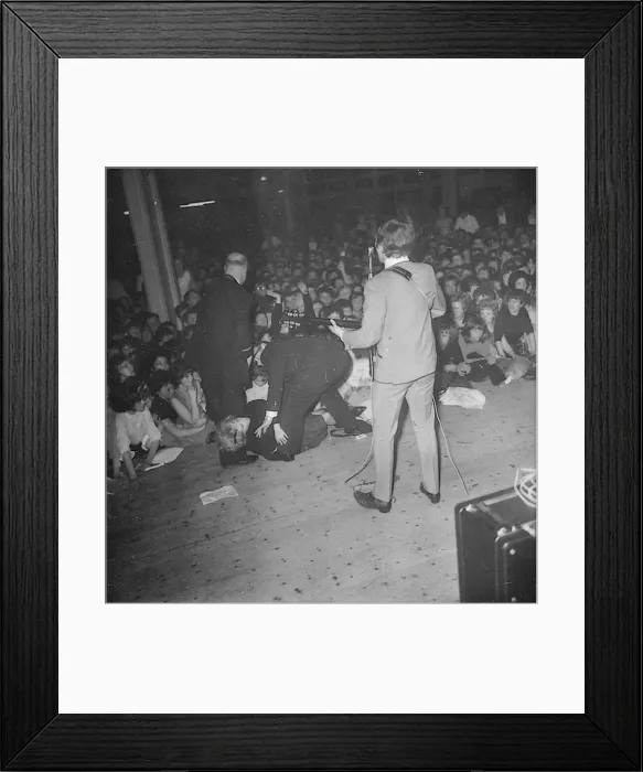 Framed Print : John Lennon performing on stage during the Beatles last British ballroom appearance Framed Print : John Lennon performing on stage during the Beatles last British ballroom appearance