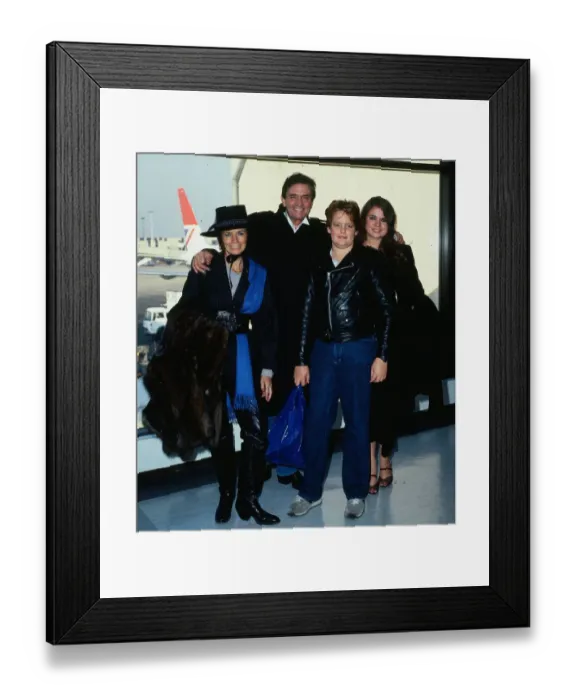 Framed Print : Johnny Cash with family at airport April 1984