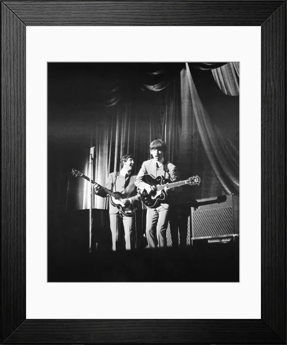 Framed Print : Paul McCartney and George Harrison onstage as The Beatles play at ABC Cinema, Northampton