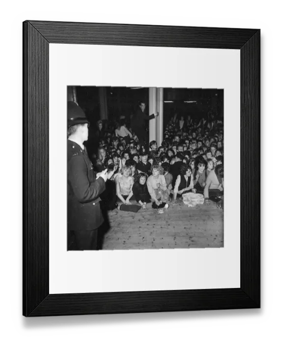 Framed Print : Beatles files 1963 Police on stage during Beatles concert in Derbyshire where fans