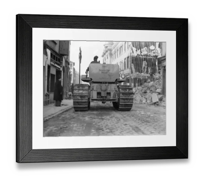 Framed Print : A Caterpillar Diesel D8 tractor moves slowly along in Smithford Street, Coventry Framed Print : A Caterpillar Diesel D8 tractor moves slowly along in Smithford Street, Coventry