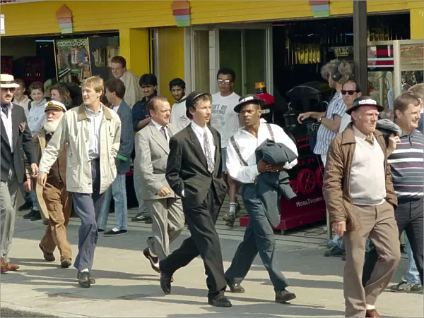 Only Fools and Horses cast members walk along the seafront at Margate beach during