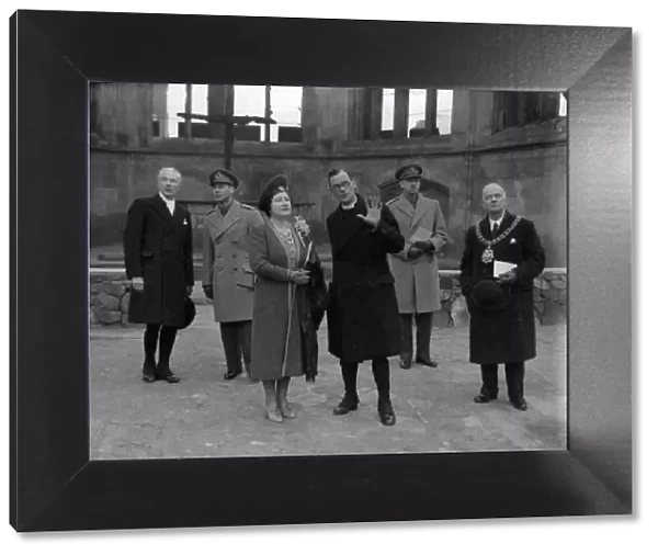 King George VI and Queen Elizabeth inspecting the ruins of Coventry Cathedral
