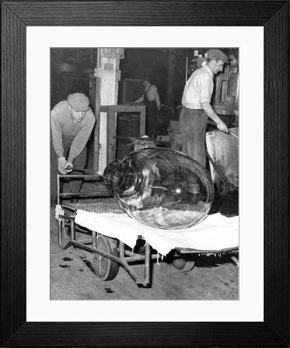Framed Print : Glass is being taken away to cool after being extracted from the mould in March 1965 Framed Print : Glass is being taken away to cool after being extracted from the mould in March 1965