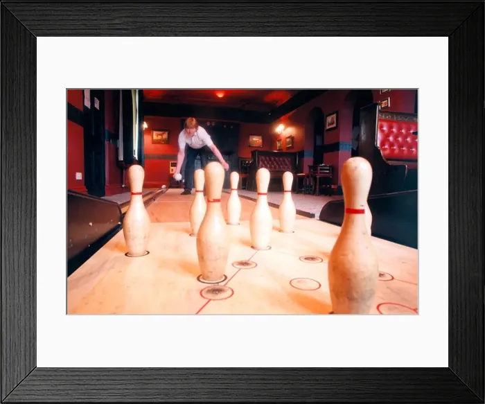 Framed Print : Terry Richardson of the Stags Head in Butterknowle playing pub ten pin bowling in May