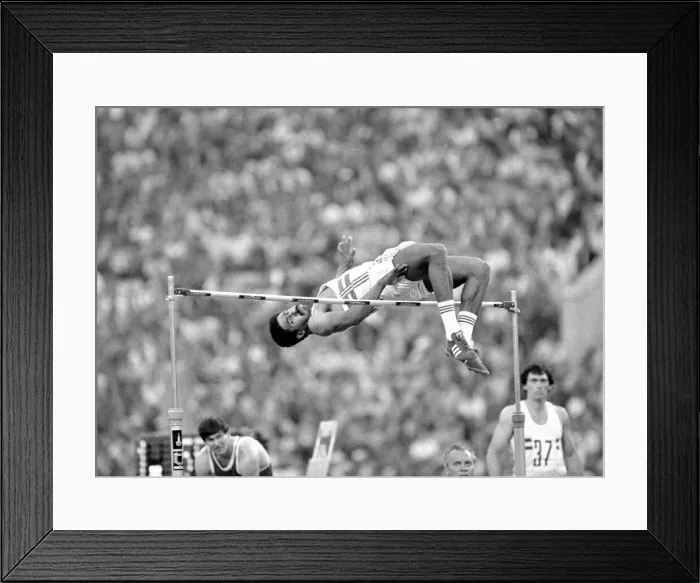 Framed Print : Daley Thompson clears the bar in the High Jump discipline of the Decathalon at the Moscow