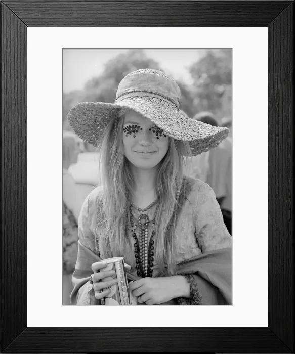 Framed Print : A Hippy lady with large hat and eye make up at the free Rolling Stones concert in Hyde Framed Print : A Hippy lady with large hat and eye make up at the free Rolling Stones concert in Hyde