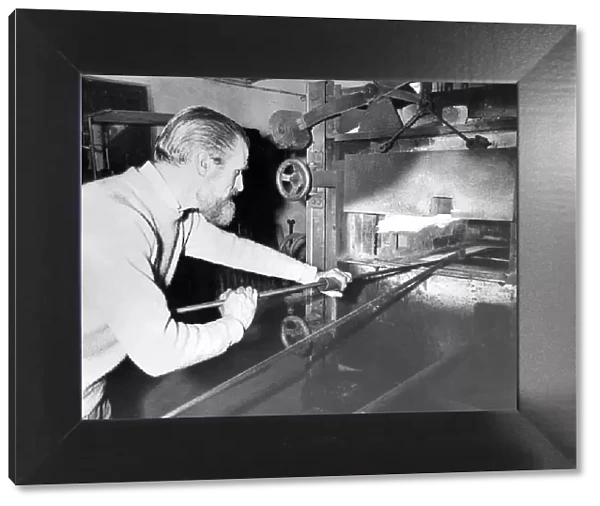 Mr. Reg Wilkinson concentrates on the production of stained glass at Hartley Wood