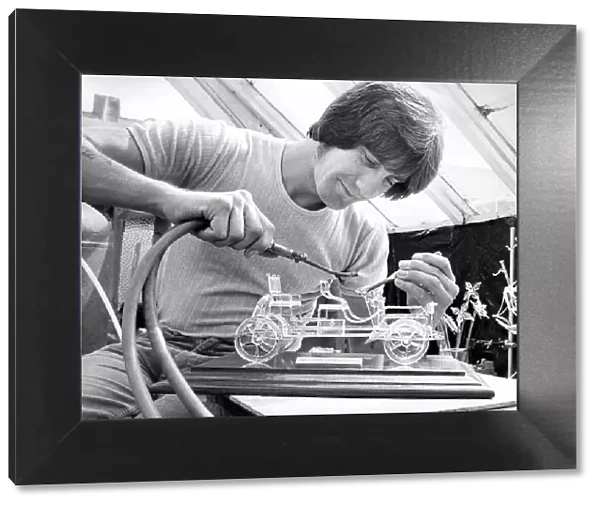Award winning artistic glass blower Raymond Storey at work in August 1979