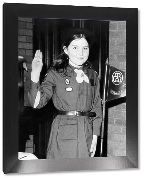 Nine year old Marion Scott in a 1974 Brownie Uniform. The current tinic costs about