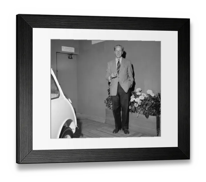 Framed Print : Designer of the British mini motor car Alec Issigonis, with one of the first cars which Framed Print : Designer of the British mini motor car Alec Issigonis, with one of the first cars which
