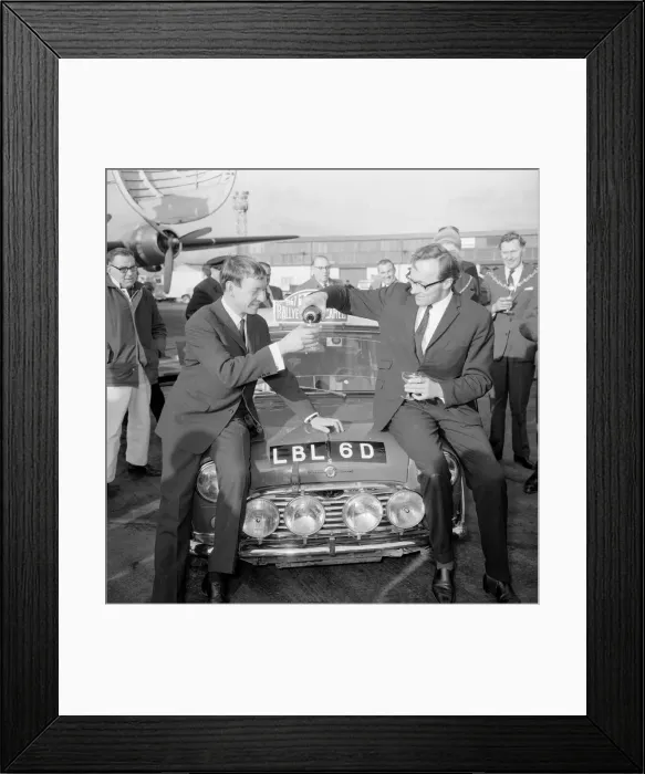 Framed Print : Finnish rally driver Rauno Aaltonen with his winning Monte Carlo rally Mini car Framed Print : Finnish rally driver Rauno Aaltonen with his winning Monte Carlo rally Mini car