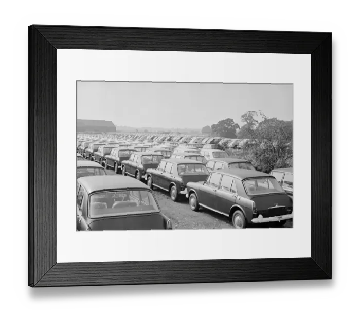 Framed Print : Thousands of new produced Austin cars stored on Wythnal Airfield shorlty after coming off Framed Print : Thousands of new produced Austin cars stored on Wythnal Airfield shorlty after coming off