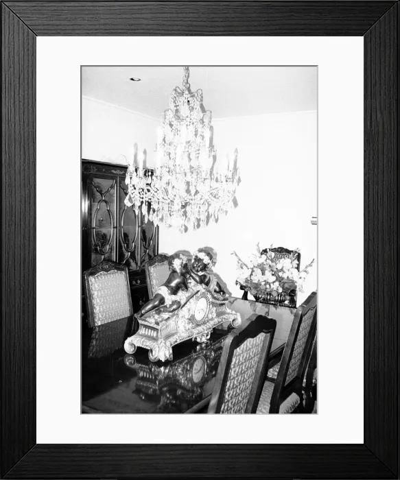 Framed Print : The dining room with its chandelier and ornamental clock September 1983