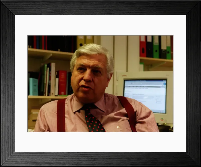 Framed Print : John Simpson News Reporter November 98 Sitting at his desk working
