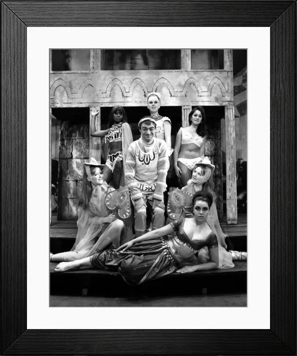 Framed Print : Roy Hudd poses with actresses who were appearing with him in a production of Framed Print : Roy Hudd poses with actresses who were appearing with him in a production of