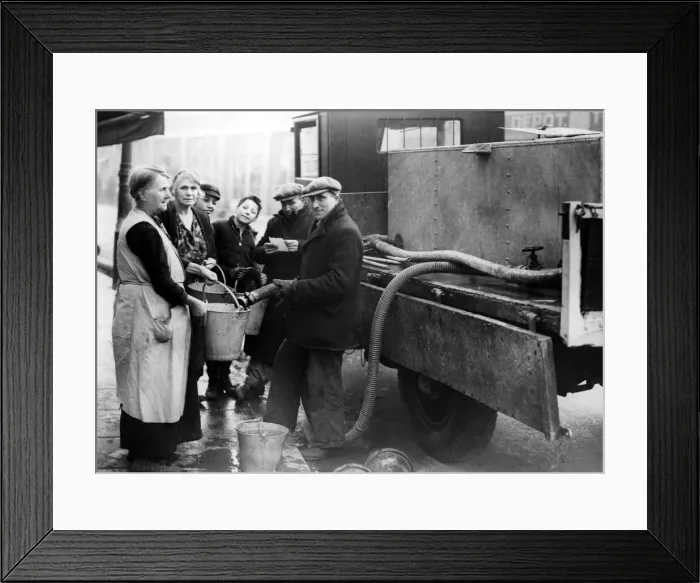 Framed Print : Coventry Corporation workers taking water round to residents that have been bombed Framed Print : Coventry Corporation workers taking water round to residents that have been bombed