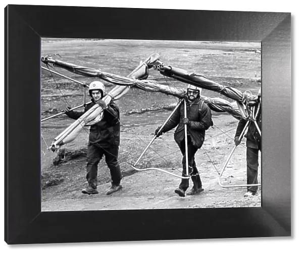 These hang gliders have a long hard trek back up the hill to start again in March 1975