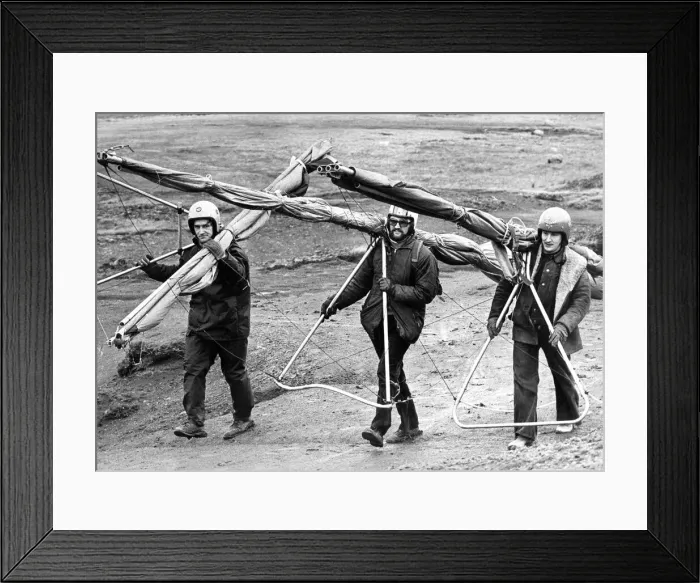 Framed Print : These hang gliders have a long hard trek back up the hill to start again in March 1975 Framed Print : These hang gliders have a long hard trek back up the hill to start again in March 1975