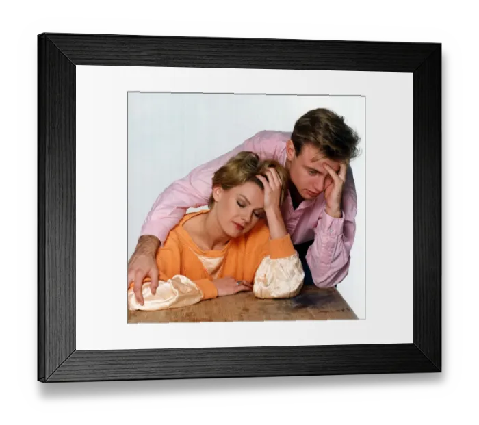 Framed Print : Couple with a hangover the morning after a night of heavy drinking December