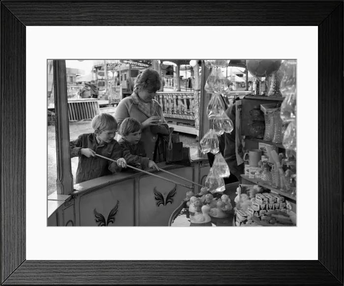 Framed Print : The Whitsun Fair at Hearsall Common, Coventry. These two children try their luck hooking