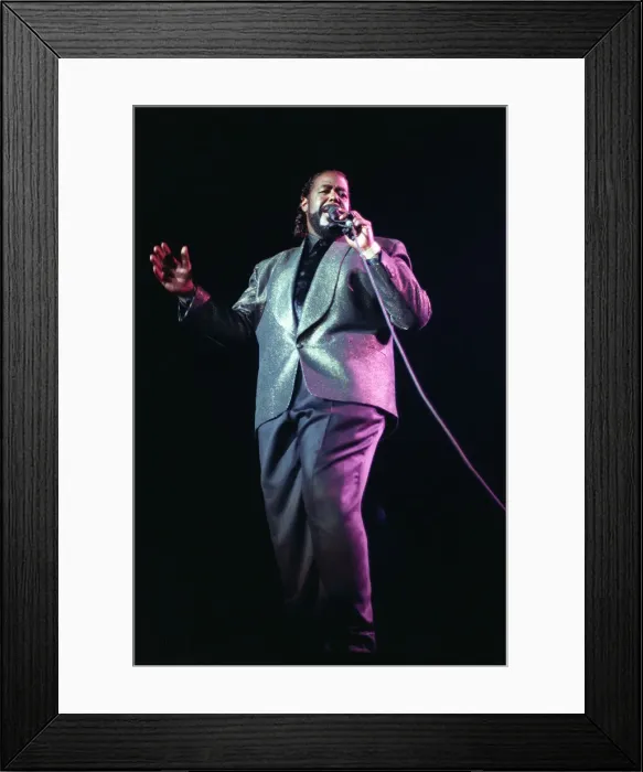 Framed Print : American singer songwriter Barry White performing in concert. December 1988 Framed Print : American singer songwriter Barry White performing in concert. December 1988