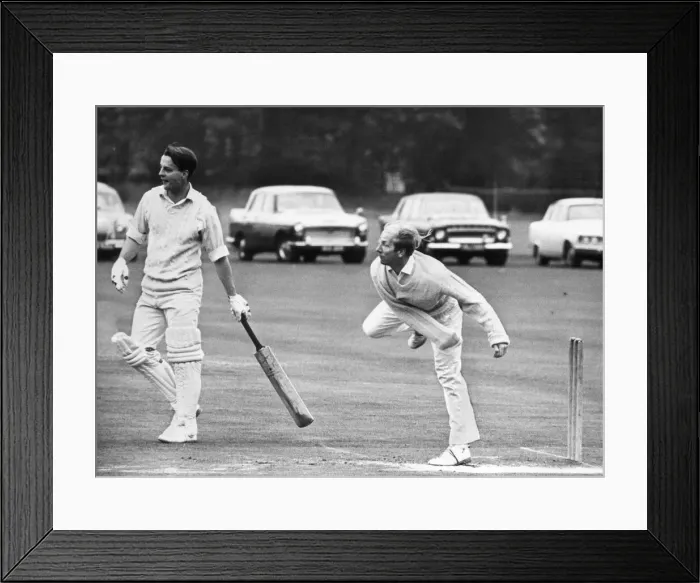 Framed Print : Manchester United and England footballer Bobby Charlton bowling to take two wickets in Framed Print : Manchester United and England footballer Bobby Charlton bowling to take two wickets in