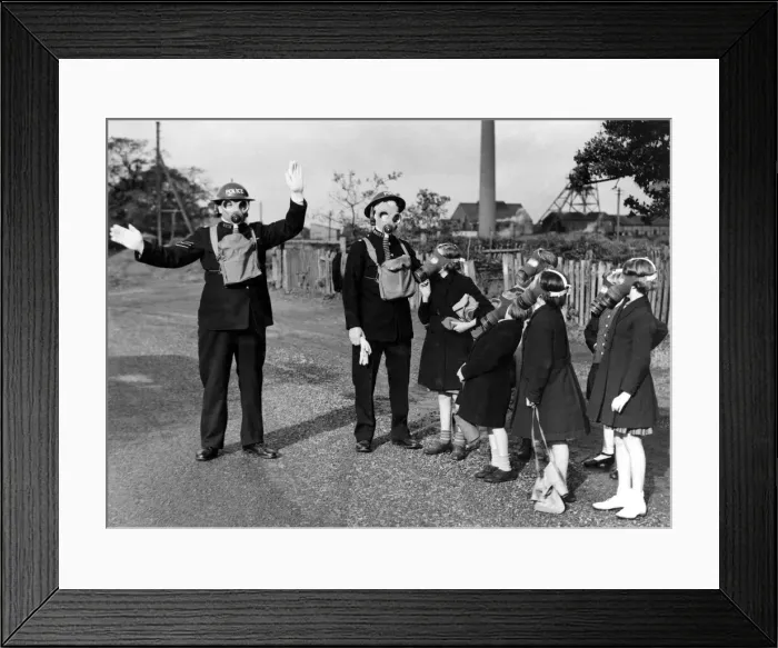Framed Print : These youngsters weren t caught unawares. They carried their gas masks as instructed Framed Print : These youngsters weren t caught unawares. They carried their gas masks as instructed