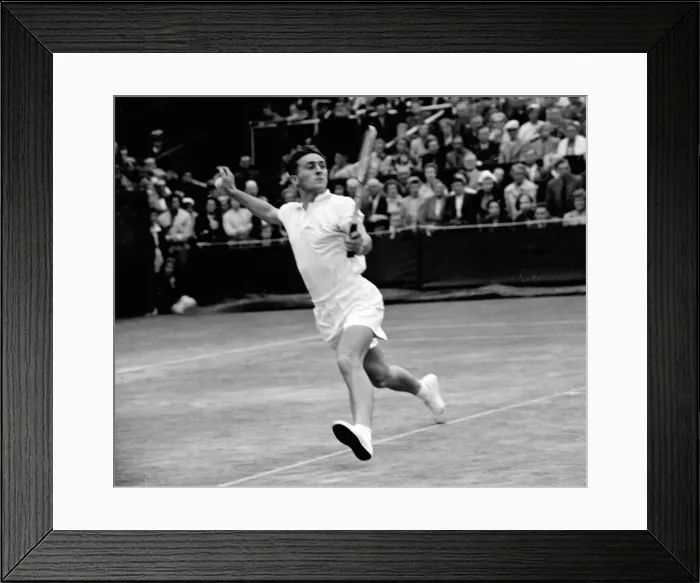 Framed Print : British tennis player John Barrett in action against Ken Rosewall of Australia during