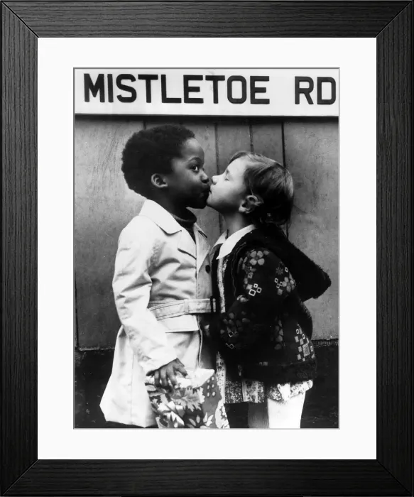 Framed Print : Children Kissing under the Mistletoe Rd sign. Mistletoe Road Circa 1973 Framed Print : Children Kissing under the Mistletoe Rd sign. Mistletoe Road Circa 1973
