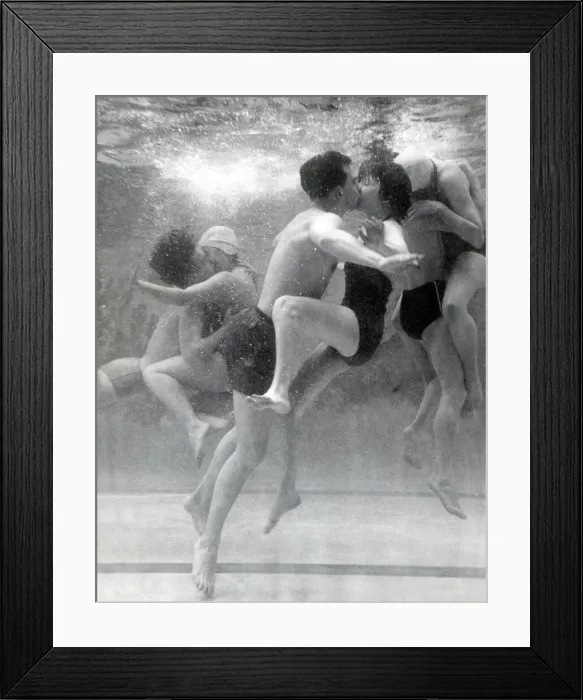 Framed Print : Couples searching for privacy beneath the waters of the pool steal a shy kiss Framed Print : Couples searching for privacy beneath the waters of the pool steal a shy kiss