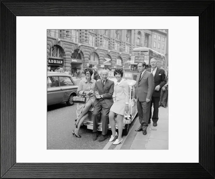 Framed Print : Judges for Daily Mirror competiton to win the two millionth mini arrive at the Cafe Royal Framed Print : Judges for Daily Mirror competiton to win the two millionth mini arrive at the Cafe Royal