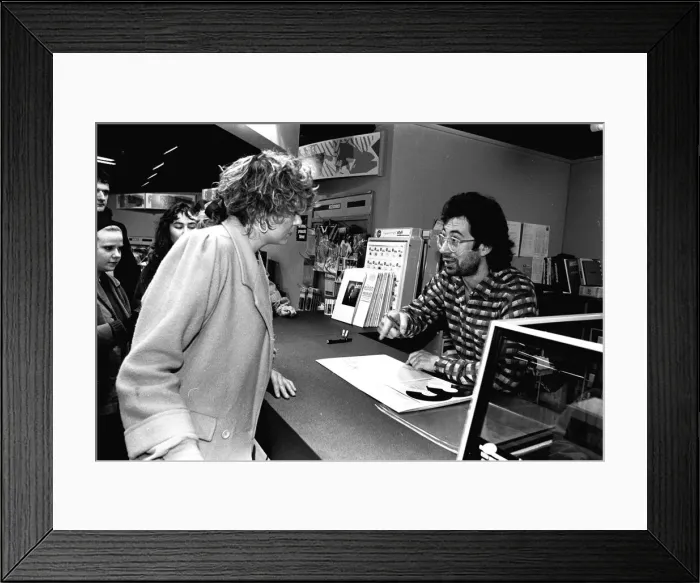 Framed Print : Comic Ben Elton took a breather from his hectic touring schedule for an autograph-signing