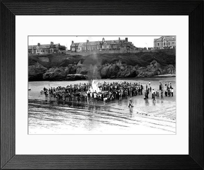 Framed Print : Models of Viking longships are burnt on the beach at Cullercoats Bay in July 1980